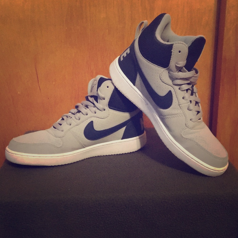 Navy and gray Nike sneakers